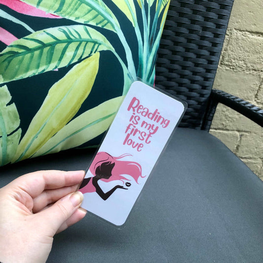 First Love Bookmark - Diamond Candlelight - girl with pink hair blowing a kiss, pink writing which says reading is my first love